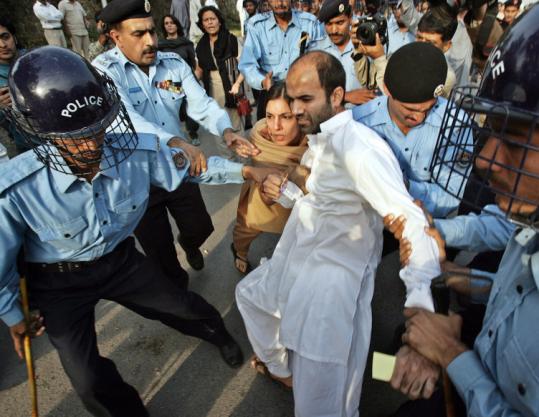 Islamabad Police beating up a protester