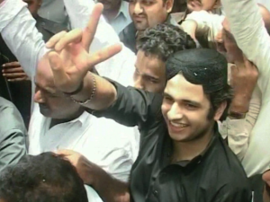 Shahrukh Jatoi flashes victory sign outside the court room after conviction